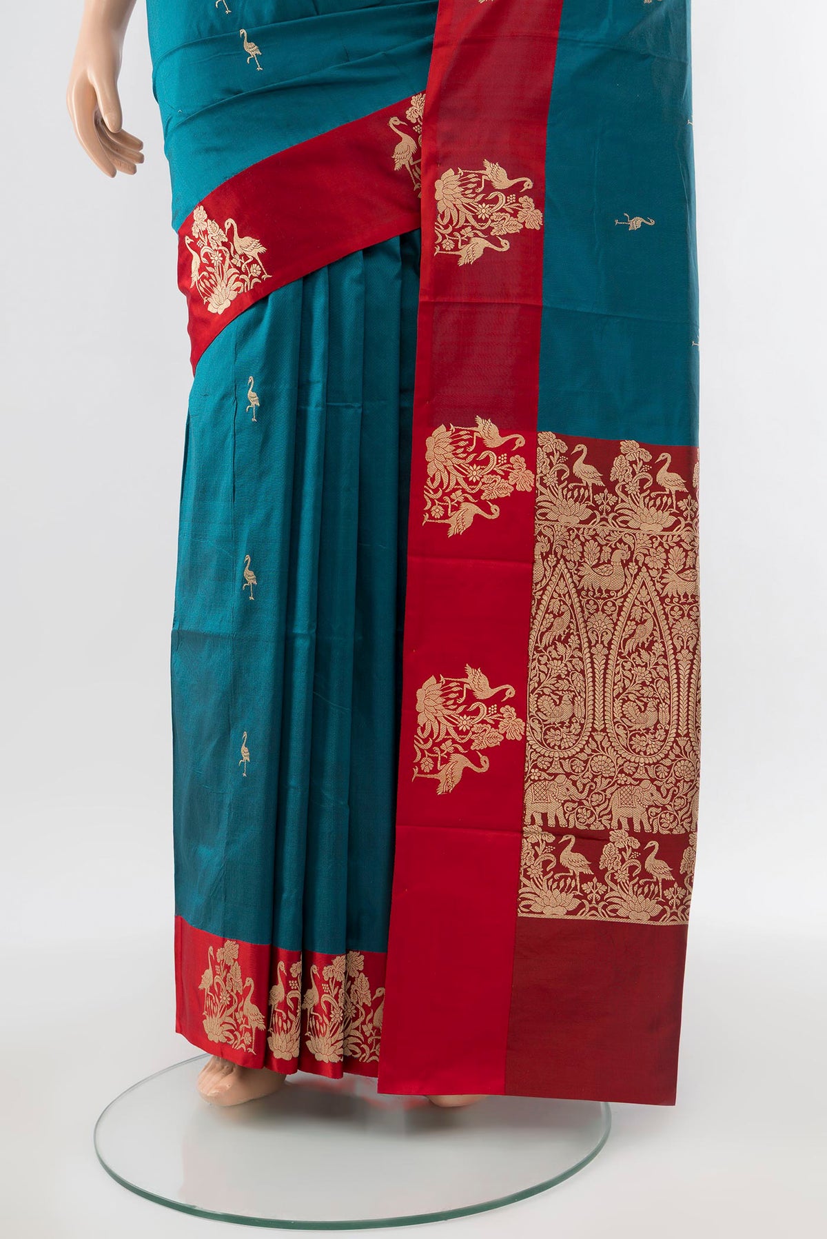 Pleats and pallu of Dark Blue Banarasi Katan Silk Saree with Zari Butta on the body and Silk Border. 