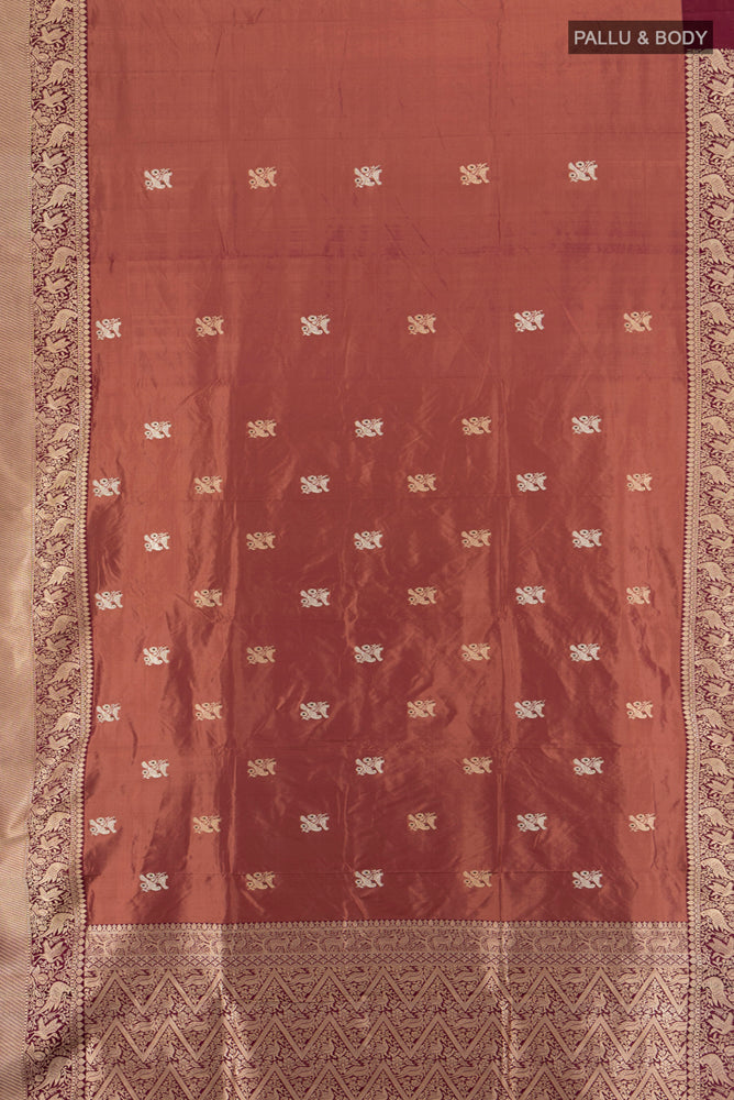 Flat view of Bronze Banarasi Katan Silk Saree with Zari Butta on the body and Silk Border. 