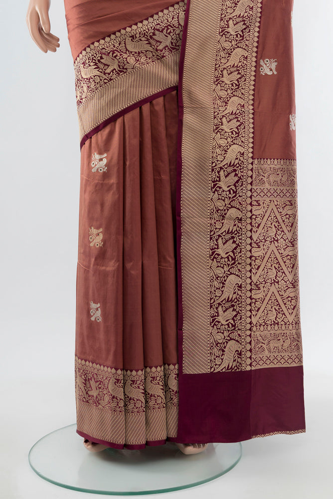 Pleats and pallu of Bronze Banarasi Katan Silk Saree with Zari Butta on the body and Silk Border. 