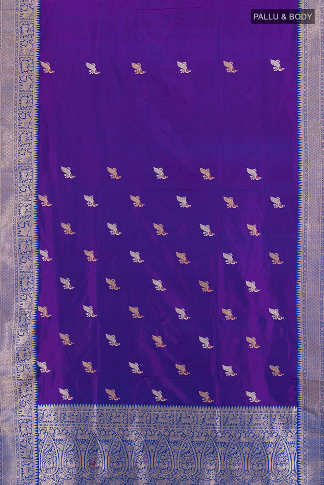 Flat view of Violet Banarasi Katan Silk Saree with Zari Butta on the body and Silk Border. 