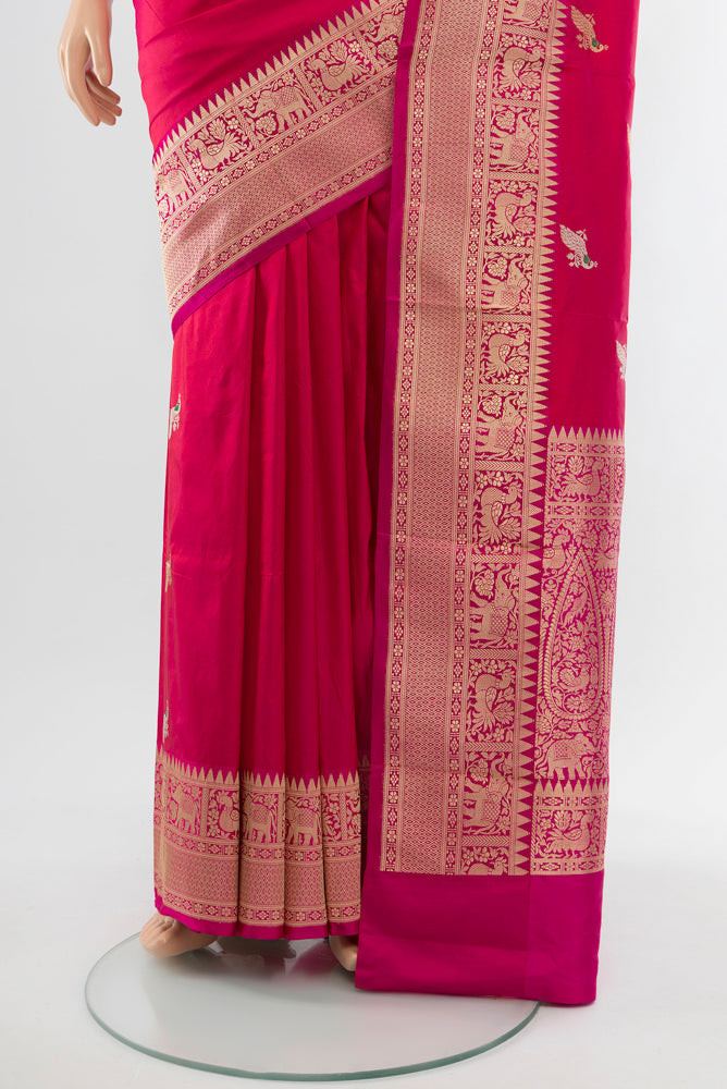 Pleats and pallu of Dark Pink Banarasi Katan Silk Saree with Zari Butta on the body and Silk Border. 