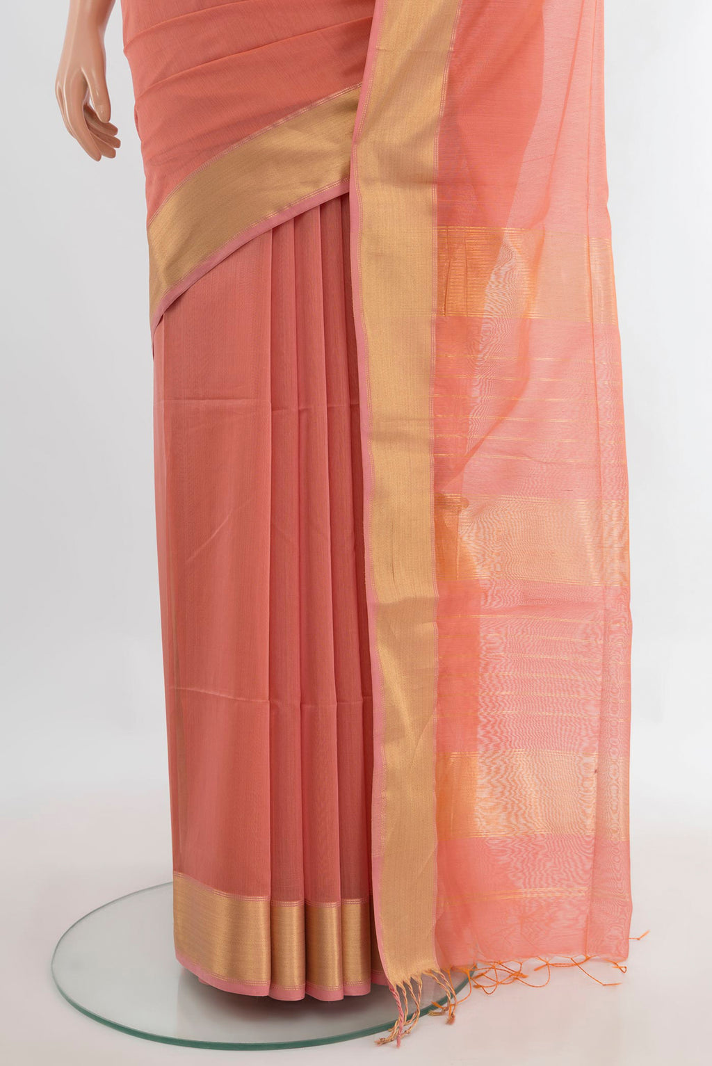 Pleats and pallu of Peach Maheshwari Cotton Saree with Plain Body and Zari Border. 