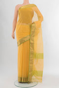 Yellow Maheshwari Silk Cotton Saree with Checked design on the body and Zari Border.  displayed on a mannequin