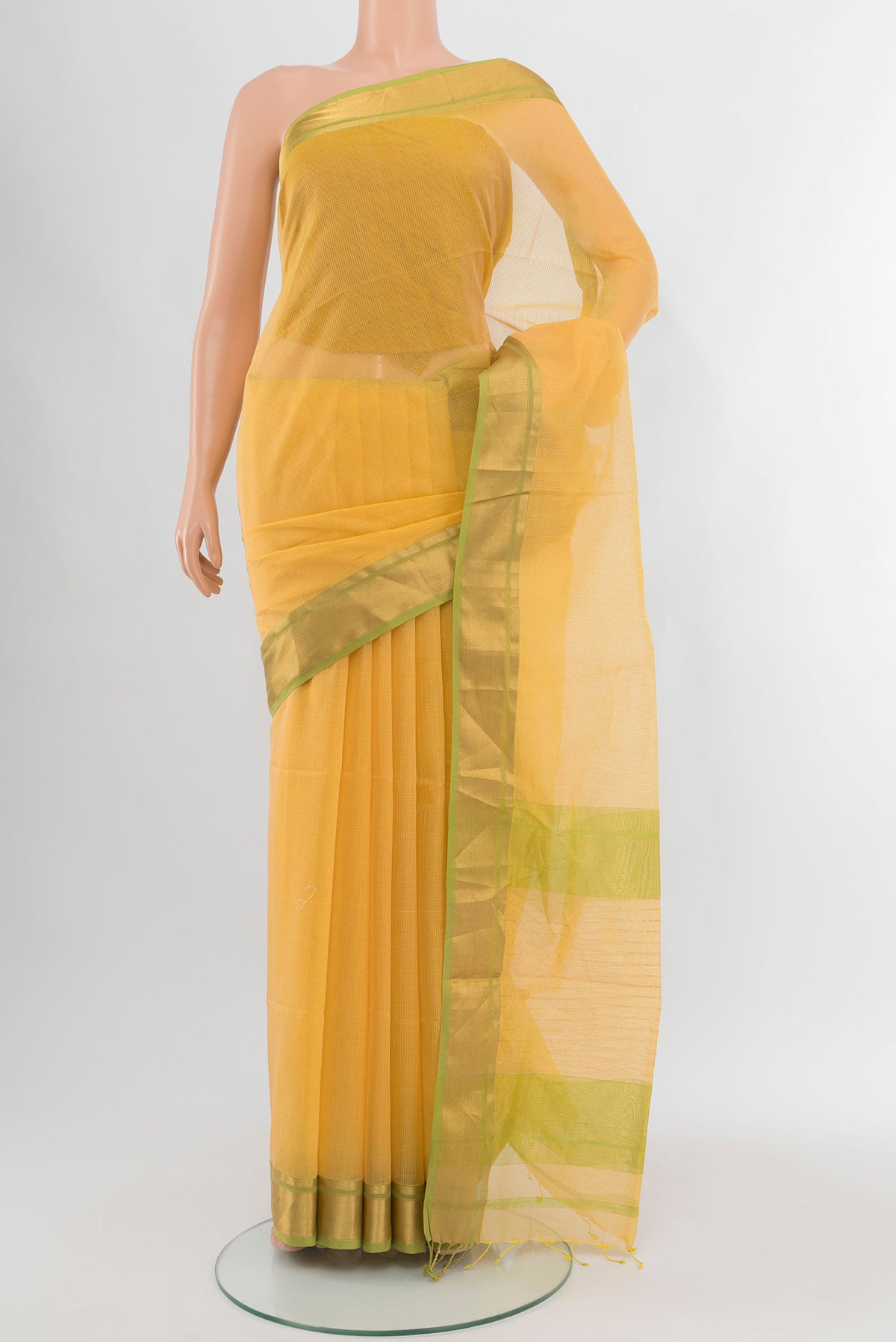 Yellow Maheshwari Silk Cotton Saree with Checked design on the body and Zari Border.  displayed on a mannequin