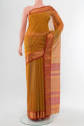 Mustard Maheshwari Silk Cotton Saree with Checked design on the body and Silk Border.  displayed on a mannequin