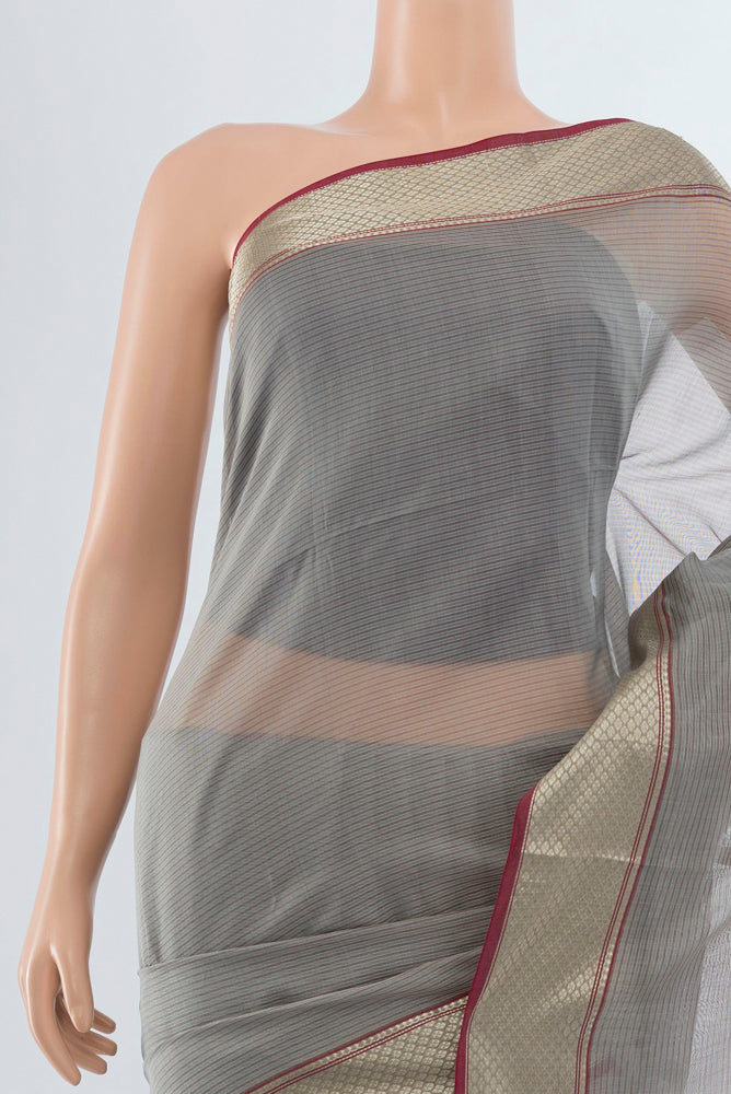 Border image of Davys Grey Maheshwari Silk Cotton Saree with Zari Butta on the body and Silk Border. 