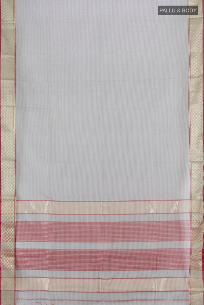 Flat view of Davys Grey Maheshwari Silk Cotton Saree with Zari Butta on the body and Silk Border. 
