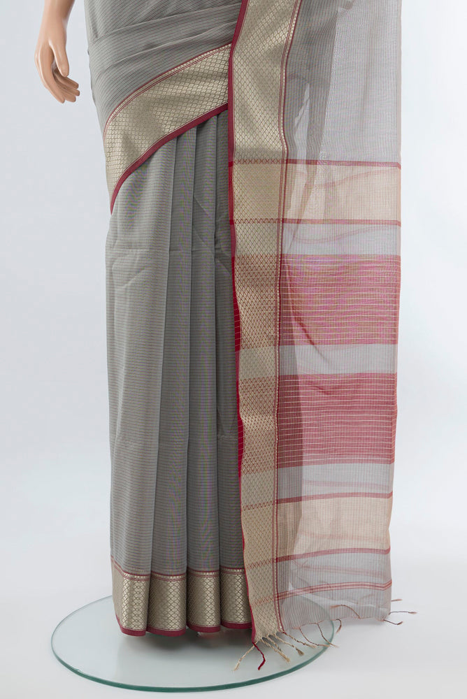 Pleats and pallu of Davys Grey Maheshwari Silk Cotton Saree with Zari Butta on the body and Silk Border. 