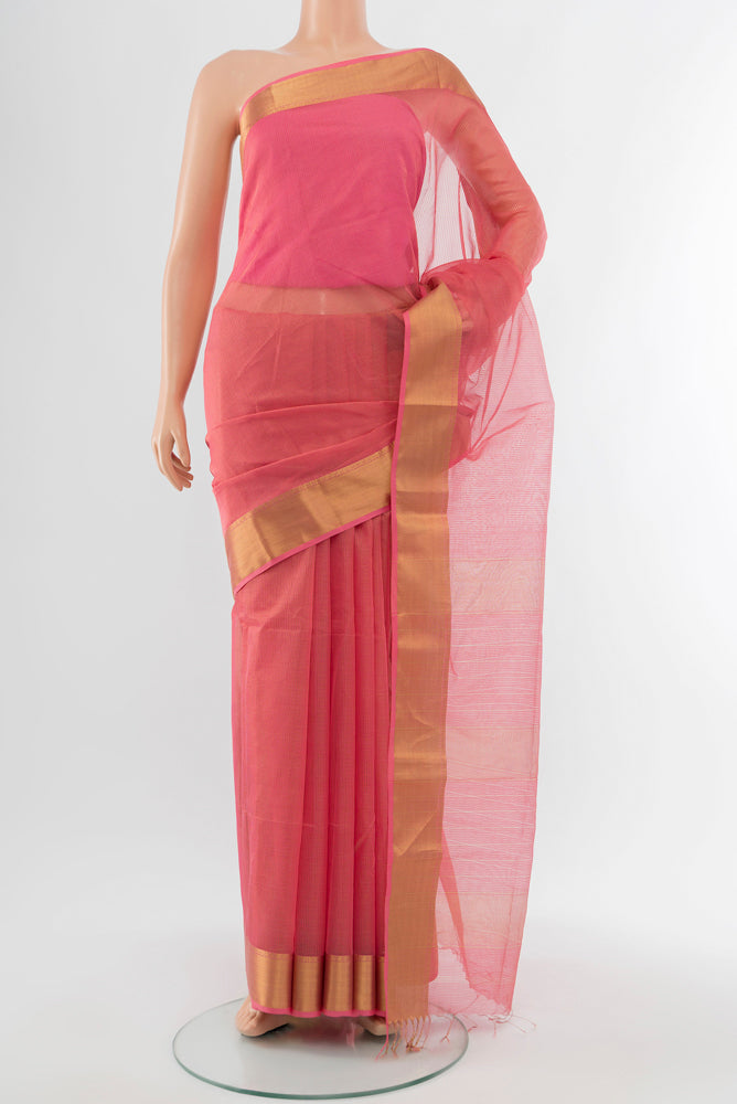 Rose pink Maheshwari Silk Cotton Saree with Checked design on the body and Silk Border.  displayed on a mannequin