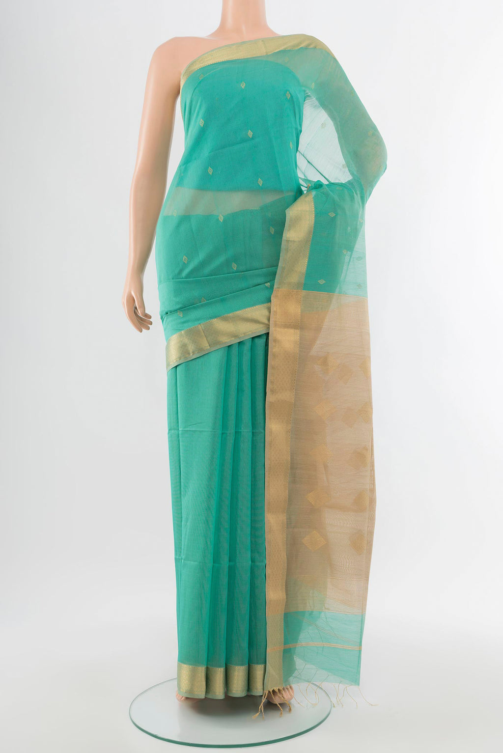 Sky Blue Maheshwari Silk Cotton Saree with Zari Butta on the body and Silk Border.  displayed on a mannequin