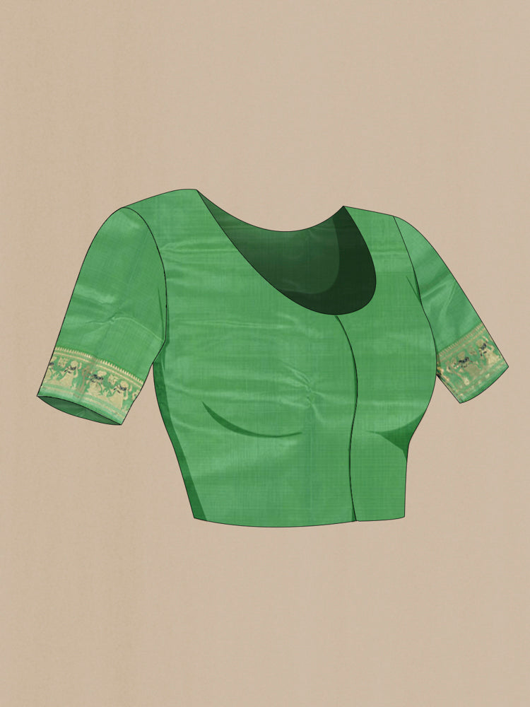 Close up image of the blouse of Light Green Baluchari Silk Saree with Zari Butta on the body and Silk Border. 