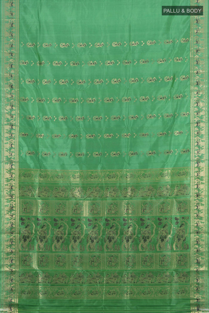 Flat view of Light Green Baluchari Silk Saree with Zari Butta on the body and Silk Border. 