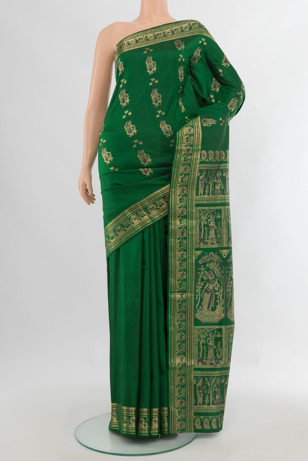 Pure Silk Green Baluchari Saree with Zari And Thread Butta on the body and Zari Border.  displayed on a mannequin