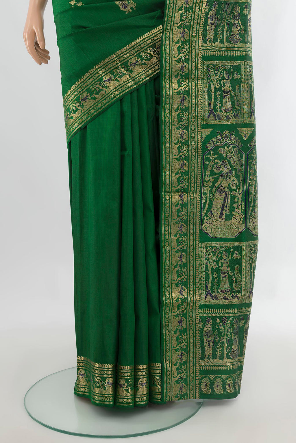 Pleats and pallu of Pure Silk Green Baluchari Saree with Zari And Thread Butta on the body and Zari Border. 