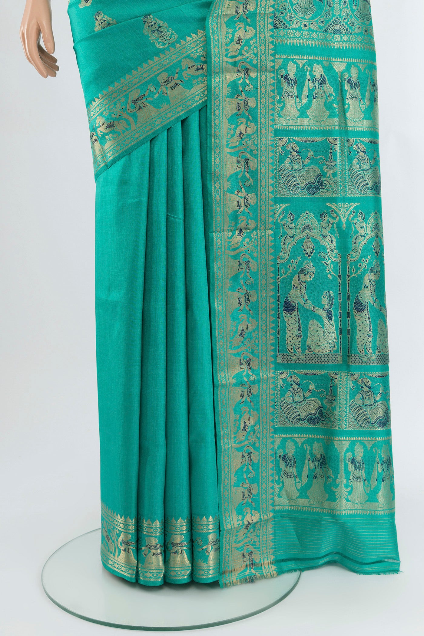 Pleats and pallu of Turquoise Baluchari Silk Saree with Zari And Thread Butta on the body and Zari Border. 