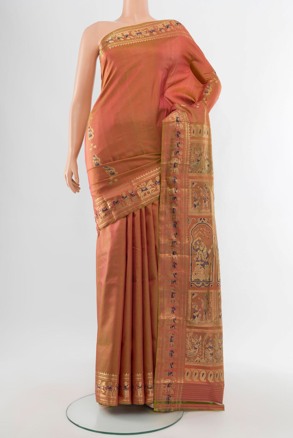 Peach Baluchari Silk Saree with Zari Butta on the body and Silk Border.  displayed on a mannequin