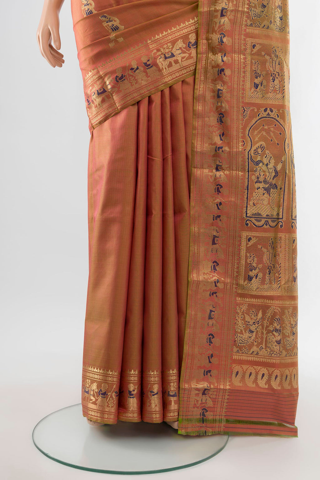 Pleats and pallu of Peach Baluchari Silk Saree with Zari Butta on the body and Silk Border. 