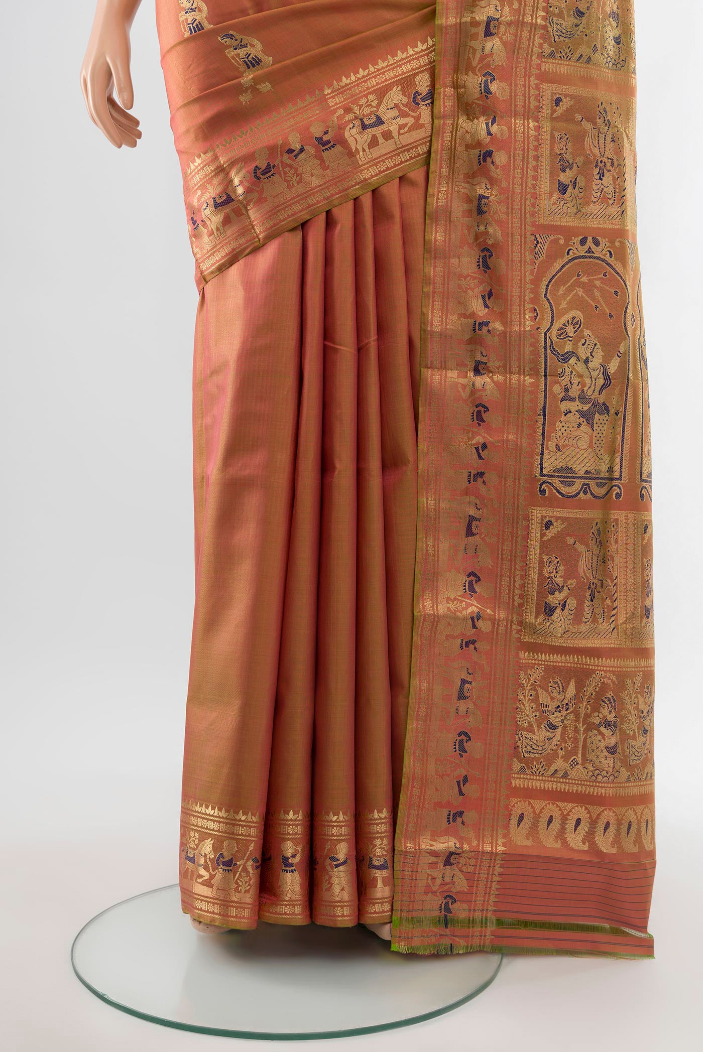 Pleats and pallu of Peach Baluchari Silk Saree with Zari Butta on the body and Silk Border. 