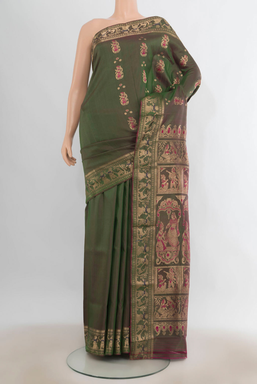 Pure Silk Green Baluchari Saree with Thread Butta on the body and Zari Border.  displayed on a mannequin
