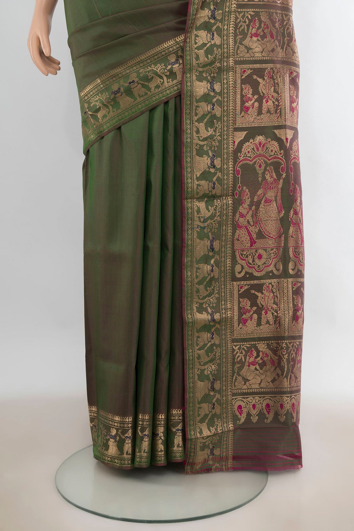 Pleats and pallu of Pure Silk Green Baluchari Saree with Thread Butta on the body and Zari Border. 