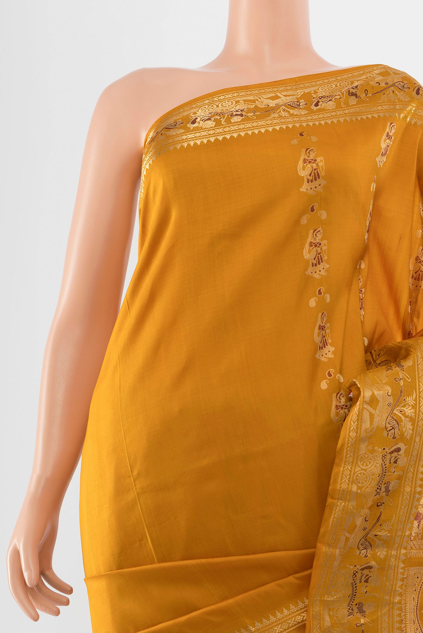 Border image of Mustard Baluchari Silk Saree with Zari Butta on the body and Silk Border. 