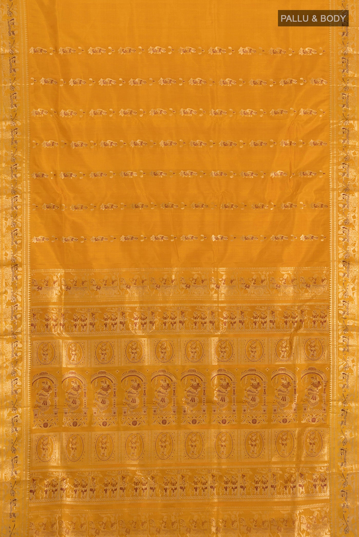 Flat view of Mustard Baluchari Silk Saree with Zari Butta on the body and Silk Border. 
