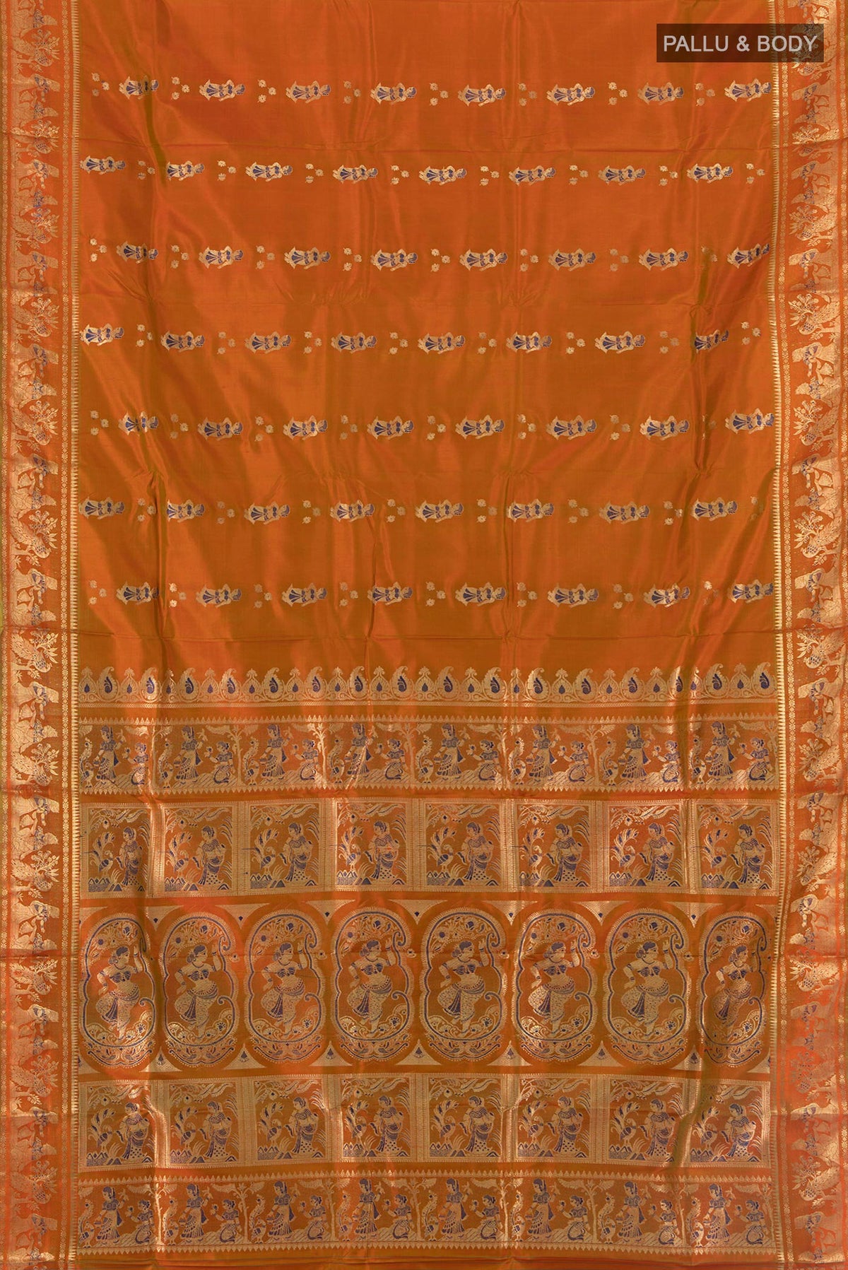 Flat view of Pure Silk Rust Baluchari Saree with Zari And Thread Butta on the body and Zari Border. 
