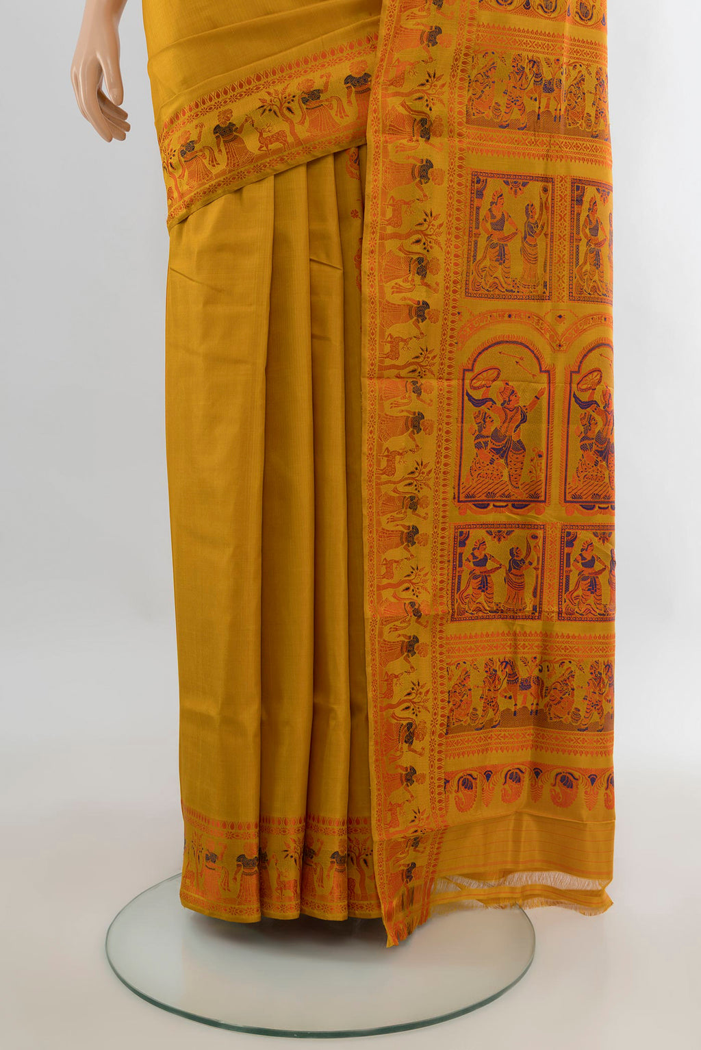 Pleats and pallu of Pure Silk Mustard Baluchari Saree with Thread Butta on the body and Thread Border. 