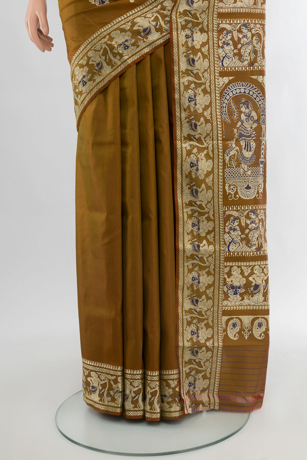 Pleats and pallu of Mehandi Green Baluchari Silk Saree with Thread Butta on the body and Silk Border. 