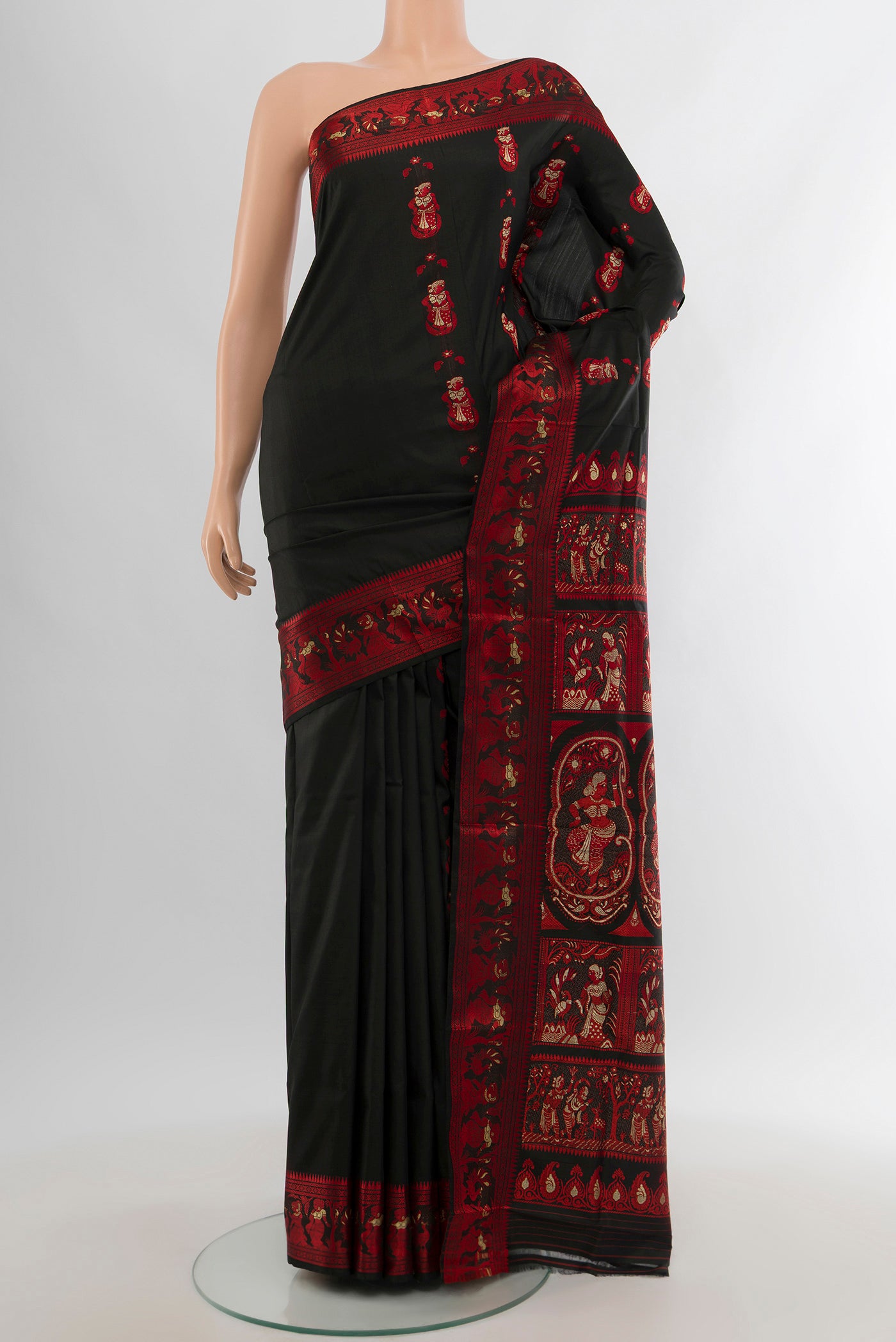 Black Baluchari Silk Saree with Thread Butta on the body and Thread Border.  displayed on a mannequin