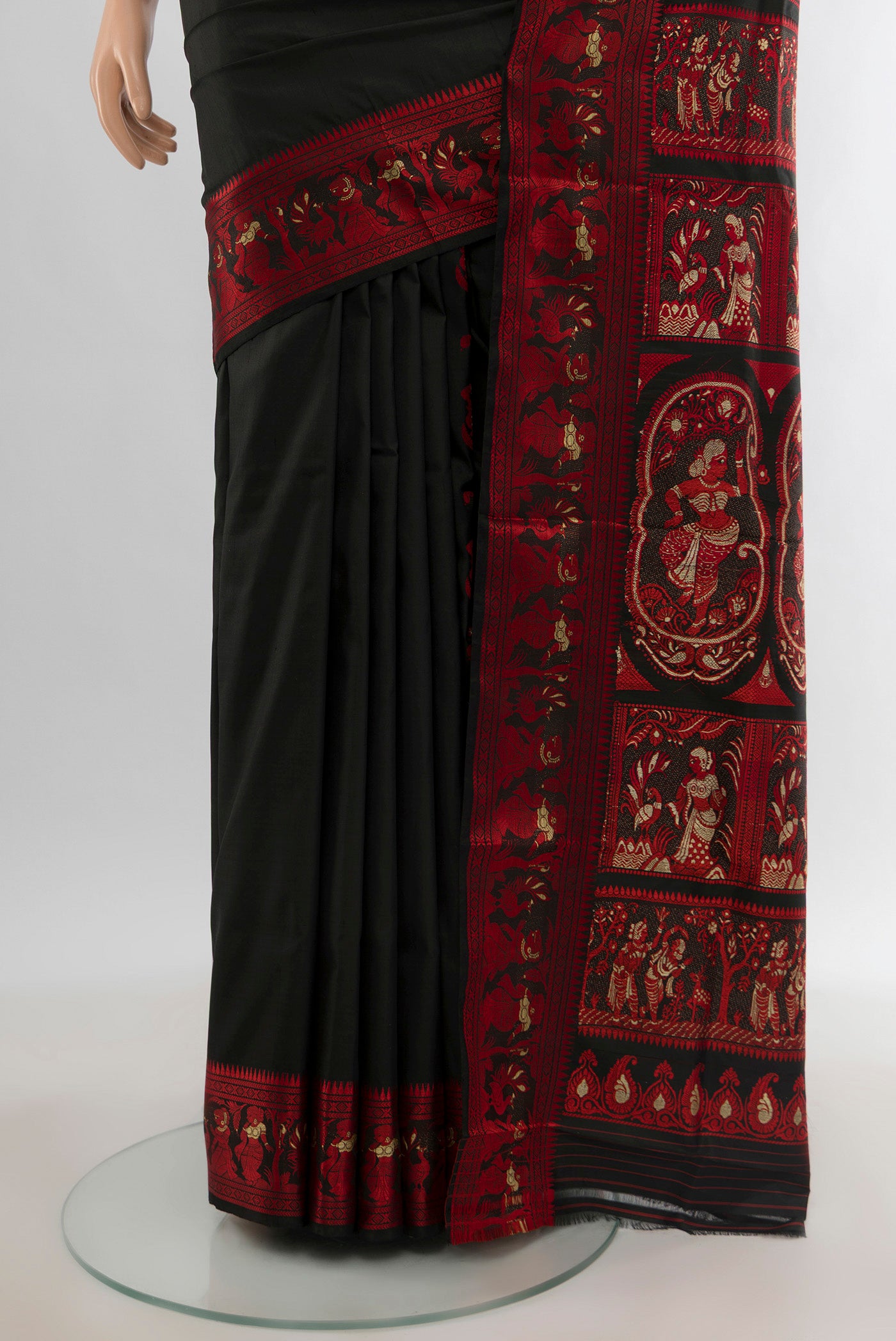 Pleats and pallu of Black Baluchari Silk Saree with Thread Butta on the body and Thread Border. 