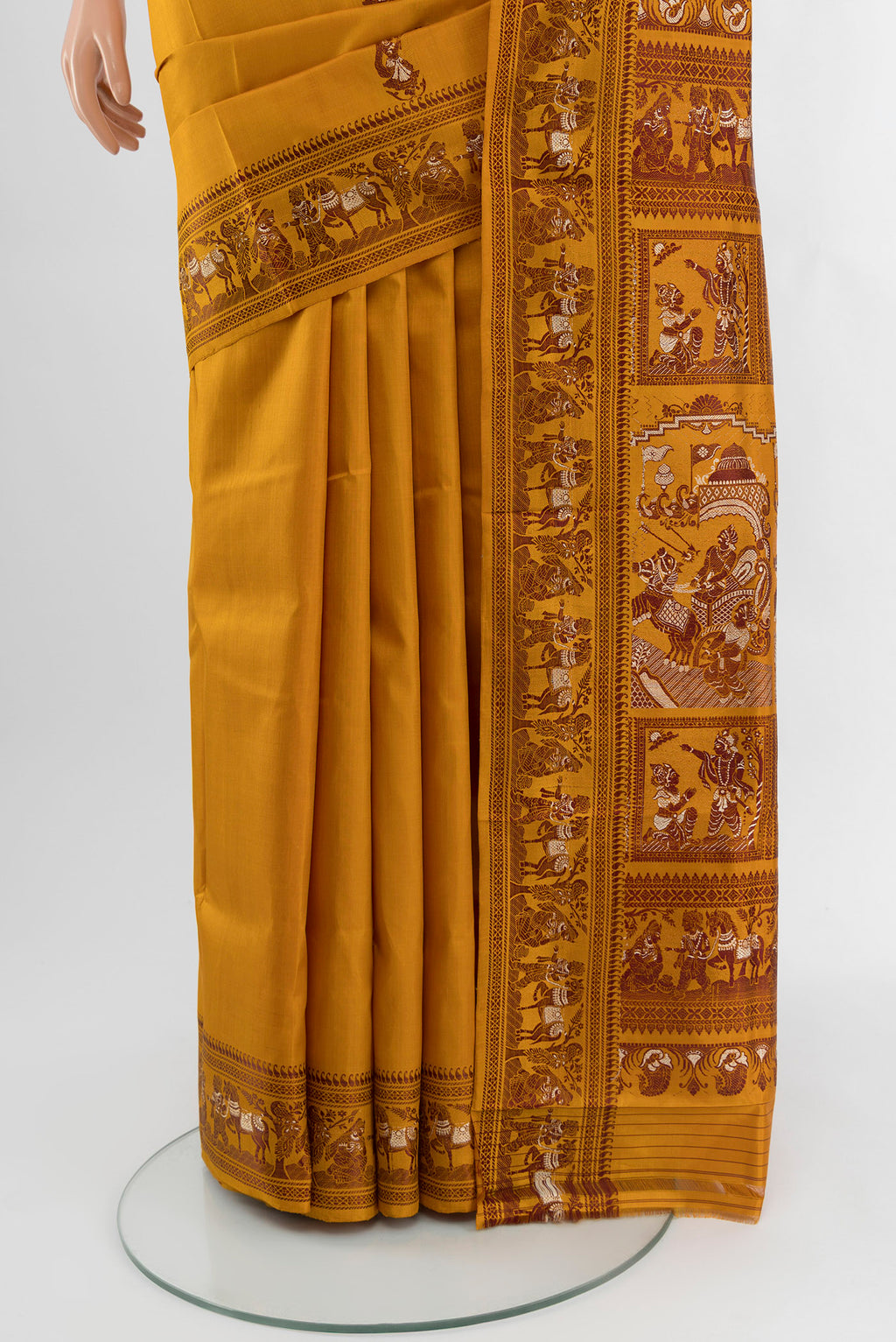 Pleats and pallu of Mustard Baluchari Silk Saree with Thread Butta on the body and Thread Border. 