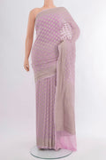 Lavender Banarasi Georgette Saree with Zari Butta on the body and Zari Border.  displayed on a mannequin