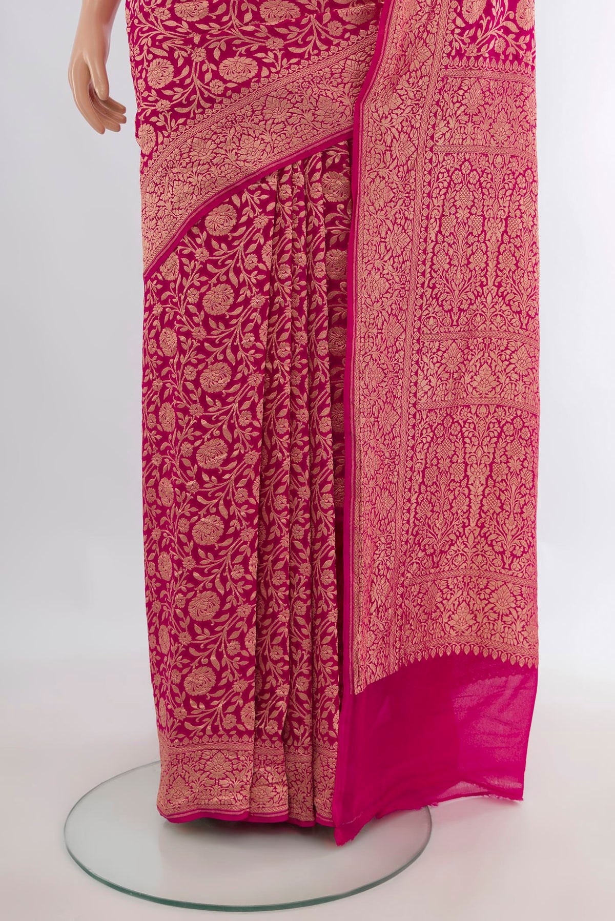 Pleats and pallu of Pink Banarasi Georgette Saree with Zari Brocade on the body and Zari Border. 