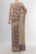 Lavender Banarasi Georgette Saree with Zari Brocade on the body and Zari Border.  displayed on a mannequin