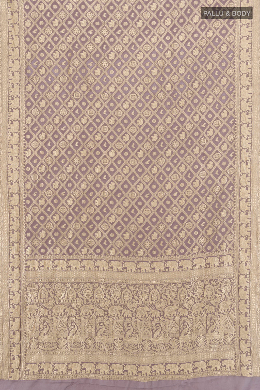 Flat view of Lavender Banarasi Georgette Saree with Zari Brocade on the body and Zari Border. 