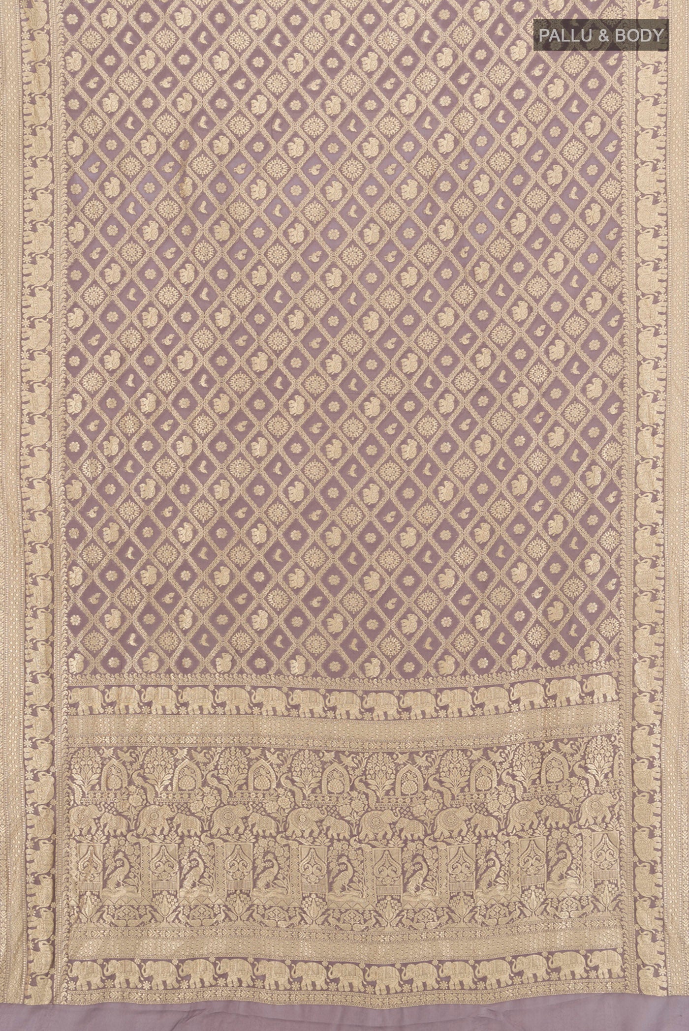 Flat view of Lavender Banarasi Georgette Saree with Zari Brocade on the body and Zari Border. 