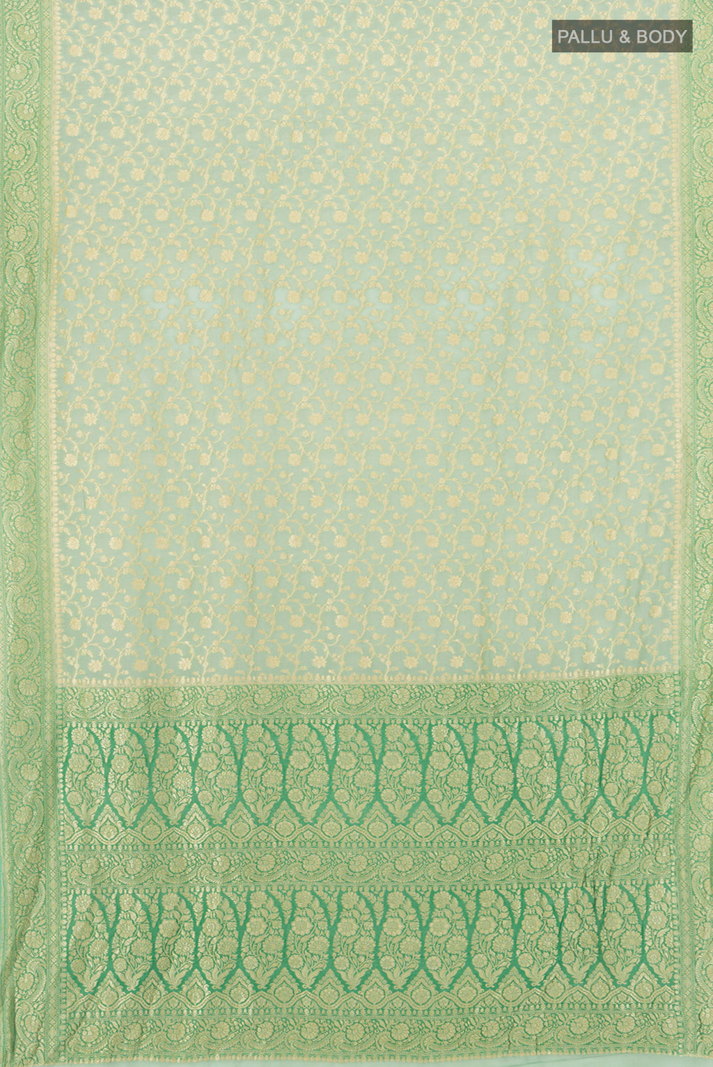 Flat view of Light Green Banarasi Georgette Saree with Zari Brocade on the body and Zari Border. 