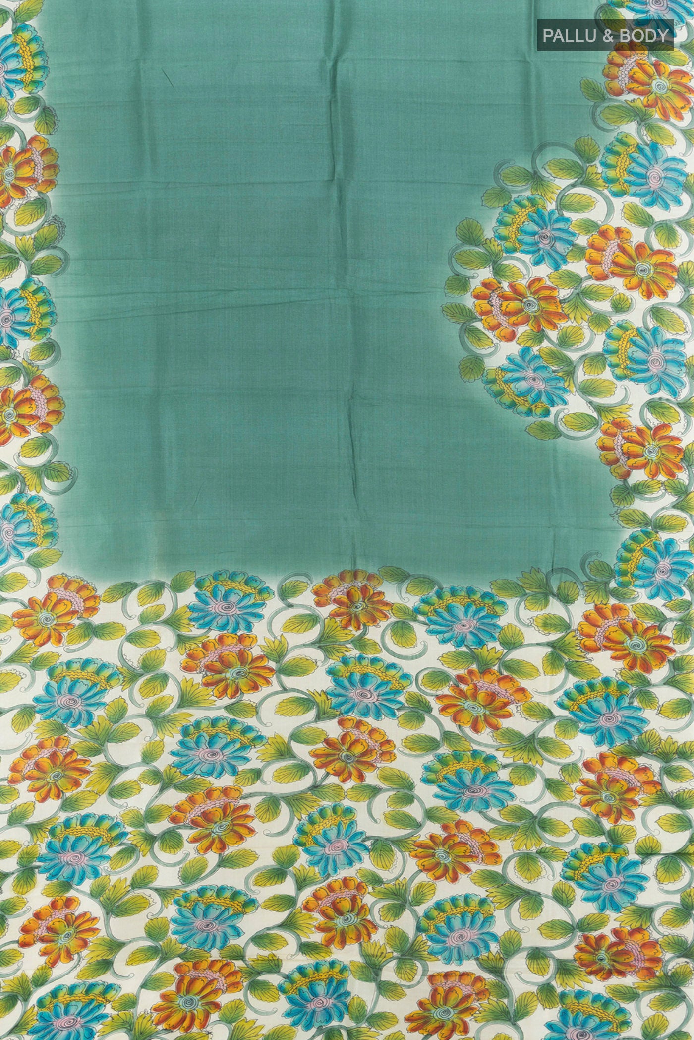 Flat view of Teal Tussar Silk Saree with Floral Print on the body and Printed Border. 