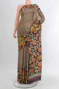 Beige Tussar Silk Saree with Printed design on the body and Zari Border.  displayed on a mannequin