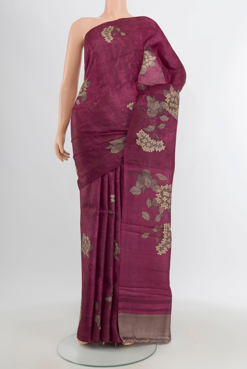 Purple Tussar Silk Saree with Floral Print on the body and Without Border.  displayed on a mannequin