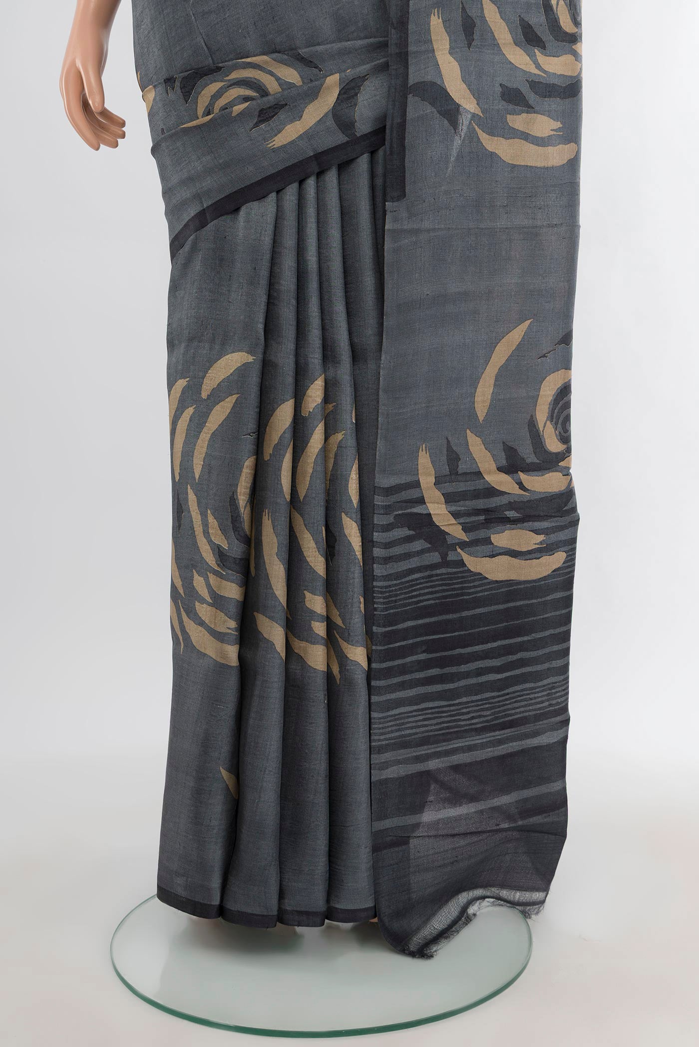 Pleats and pallu of Davys Grey Tussar Silk Saree with Plain Body and Without Border. 