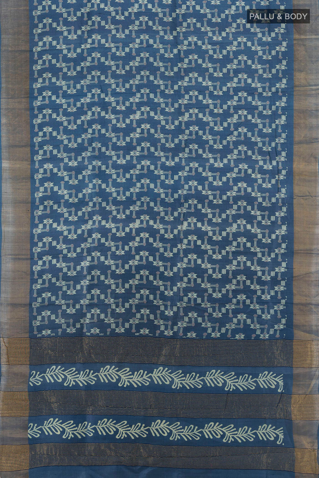 Flat view of Blue Tussar Silk Saree with Floral Print on the body and Zari Border. 