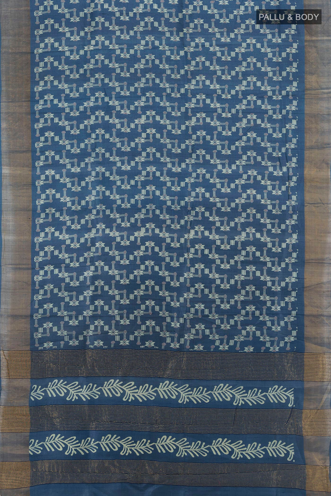 Flat view of Blue Tussar Silk Saree with Floral Print on the body and Zari Border. 