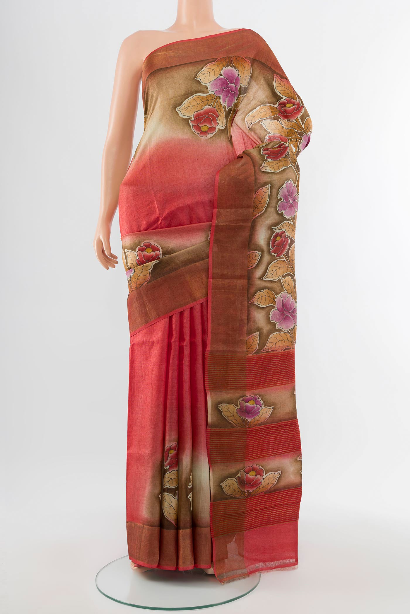 Multi Color Tussar Silk Saree with Floral Print on the body and Silk Border.  displayed on a mannequin