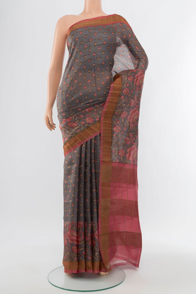 Multi Color Tussar Silk Saree with Fancy on the body and Silk Border.  displayed on a mannequin