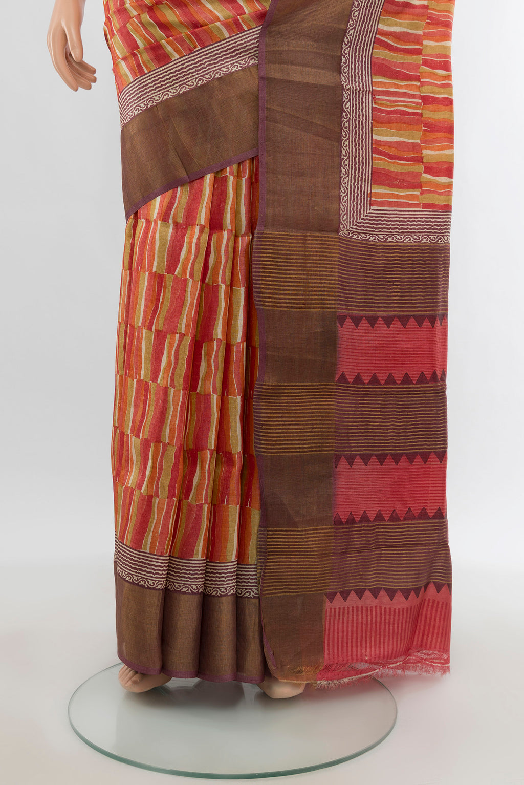 Pleats and pallu of Multi Color Tussar Silk Saree with Printed design on the body and Zari Border. 