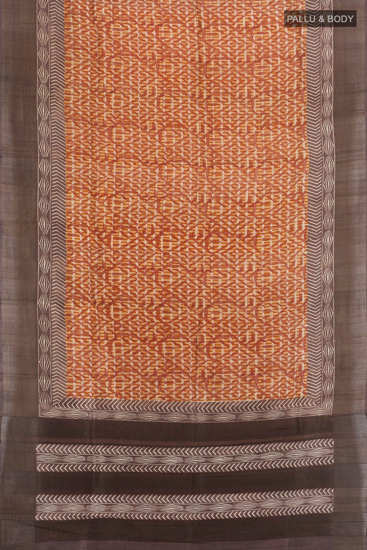 Flat view of Mustard Tussar Silk Saree with Floral Print on the body and Printed Border. 