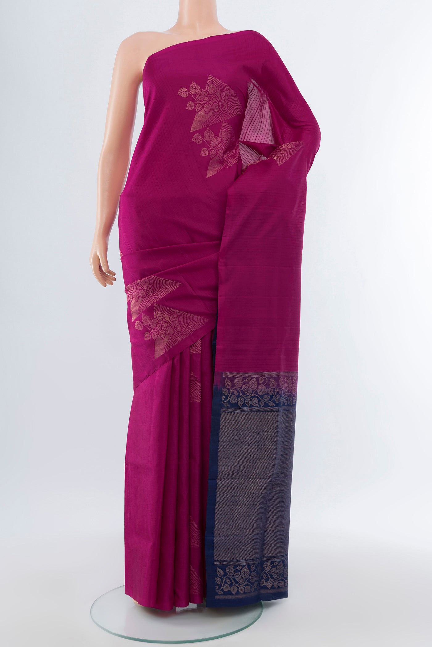 Pure Silk Pure Zari Purple Soft Saree with Zari Butta on the body and Silk Border.  displayed on a mannequin