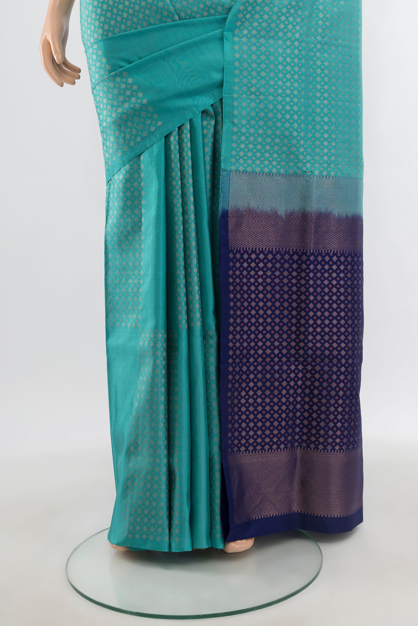 Pleats and pallu of Sky Blue Soft Silk Saree with Zari Butta on the body and Without Border. 